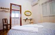 Kamar Tidur 3 Fatima Lounge Guesthouse