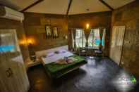 ห้องนอน Sorina Hillside Resort