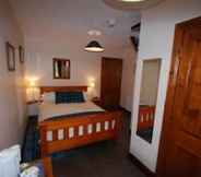 Bilik Tidur 6 Dunlichity House B&B