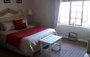 Phòng ngủ 2 Umuzi Guesthouse