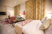 Bedroom Tanuma Aram - Hotel Apartments