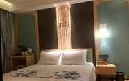 Kamar Tidur 5 Enze Aizhu Hotel
