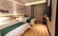 Kamar Tidur 3 Enze Aizhu Hotel