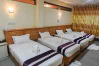 Kamar Tidur Lucky Land Hotel