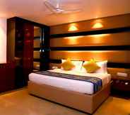 Bedroom 6 Mango Hotels Haridwar