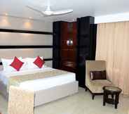 Bedroom 2 Mango Hotels Haridwar