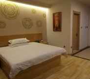 Bedroom 4 GreenTree Inn DaLian JinZhou District Light Industry College Express Hotel