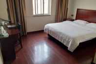 ห้องนอน GreenTree Inn NanJing Lukou KongGang General Avenue Express Hotel