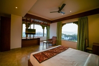 Kamar Tidur The Ramvilas - A Rooftop Lake View Hotel in Udaipur