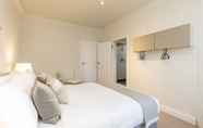 Bedroom 6 Grand Swiss Cottage Apartment