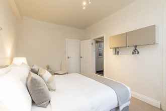 Bedroom 4 Grand Swiss Cottage Apartment