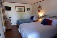 Phòng ngủ Wooden Boat Inn