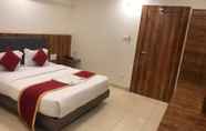 ห้องนอน 7 Hotel AK International Rooms