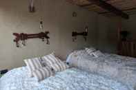 Bedroom Mamaq Tambo Lodge