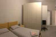 ห้องนอน Appartamento Sant'Ambrogio nel cuore di Firenze