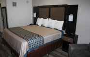 Bedroom 6 Coratel Inn & Suites by Jasper Inver Grove Heights