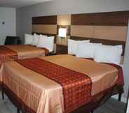 Bedroom 7 Coratel Inn & Suites by Jasper Inver Grove Heights