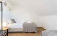 Bedroom 4 Rato Cozy 3BR with Balcony, by LU Holidays