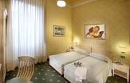 Bedroom 3 Grand Hotel Plaza e Locanda Maggiore