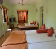 Kamar Tidur 4 Nisarg Resort