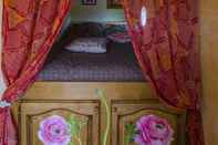 Phòng ngủ L'ecrin du Segala - La roulotte