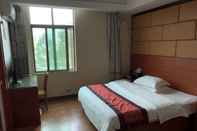 Kamar Tidur Puqian Business Hotel