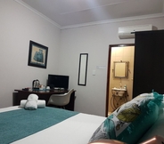 Kamar Tidur 4 Izinga Guest House