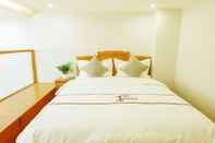 Kamar Tidur Qingcheng Sunrise Sailing Hotel