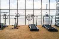 Fitness Center Modern and Cozy Studio Room @ Oasis Apartment