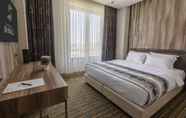 Kamar Tidur 4 Shimall Deluxe Hotel