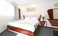 Kamar Tidur 6 Queen Stay Apartments