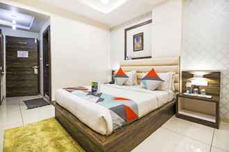 Kamar Tidur 4 FabHotel Royal Palace