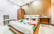 Kamar Tidur 4 FabHotel Golden Village