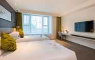 Kamar Tidur 3 The Mulian Hotel Suzhou Branch