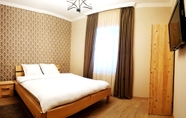 ห้องนอน 5 Cozy Hotel Kazbegi