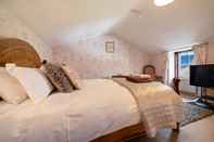 Kamar Tidur Rowan Tree Country Hotel