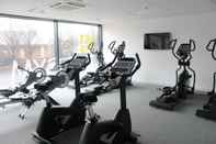 Fitness Center Warm and Welcoming Apartments