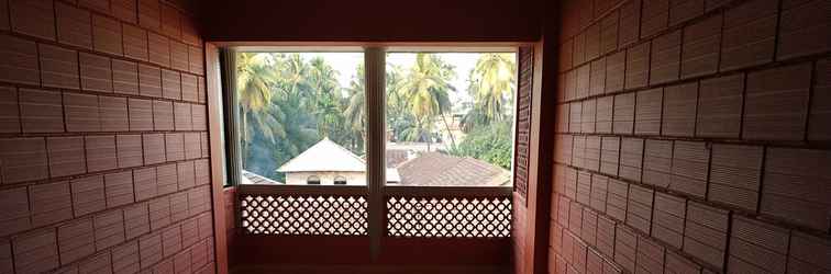 Lobby Iroomz Savitri Guest House