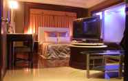 Kamar Tidur 4 Beverly Commercial Motel