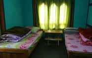 ห้องนอน 3 Thuji Homestays