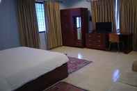 Kamar Tidur The Tanay's Dibrugarh Residency