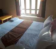 Kamar Tidur 4 Kuenley Home stay