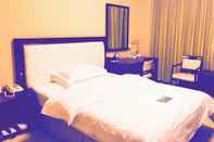 ห้องนอน Dalian Royal Hotel