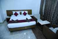 ห้องนอน Hotel Sarayu