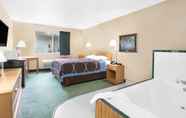 Bedroom 4 Northwoods Inn & Suites