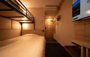 Bedroom 2 Super Hotel Niihama