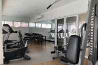 Fitness Center Romantic Urban Getaway by Primitive Stay