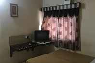 ห้องนอน Iroomz Amrutha Residency