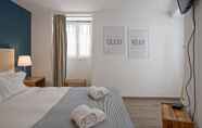Kamar Tidur 5 Cozy Apartment in Lisbon's Center