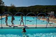 Swimming Pool Camping le Paisserou - Bungalow